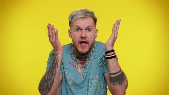 Cheerful Tourist Man Raising Hands in Surprise Shocked By Sudden Victory Meeting Someone Wow Emotion