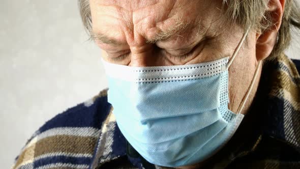 Sick Man in Medical Mask Is Suffocating, Breathing Heavily, He Does Not Have Enough Oxygen