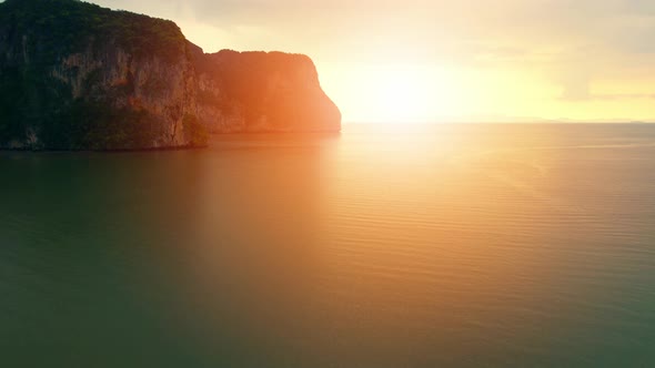 Aerial sunset above mountain silhouette. Beautiful views of the Andaman Sea