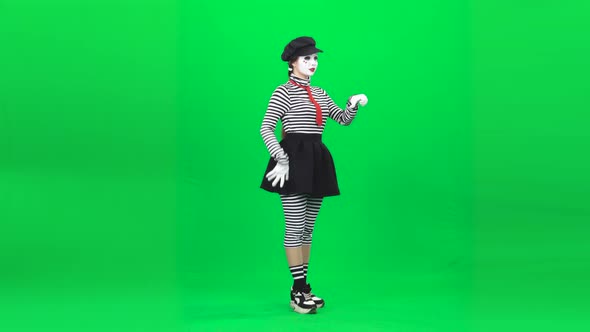 Mime Girl Riding Scooter, Waving Someone. Chroma Key. Full Length.