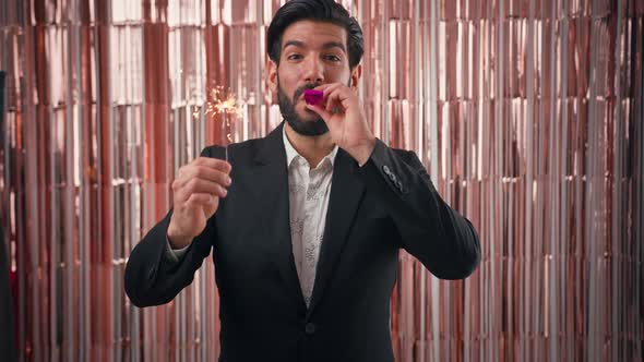 Handsome Seductive Confident Bearded Cuban Entrepreneur Man in Black Suit Blowing Party Horn and