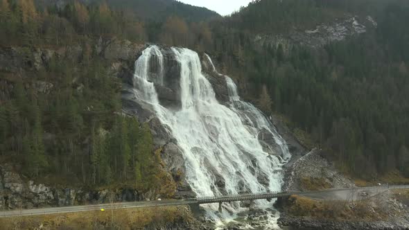 Drone Pull Back Shot of the Famous Furebergfossen Waterfall in Norway