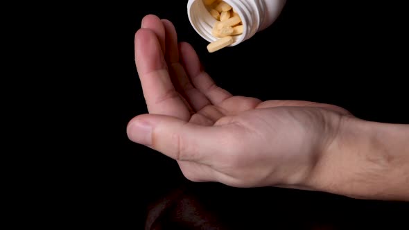 Prescription Medication Pills Being Poured into a Drug Addict's Hand, Slow Motion