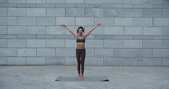 Barefoot Black Woman Does Tree Asana Doing Yoga Outdoors