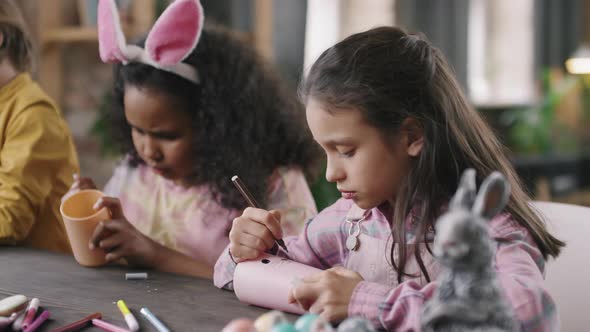 Kids Decorating Cups for Easter