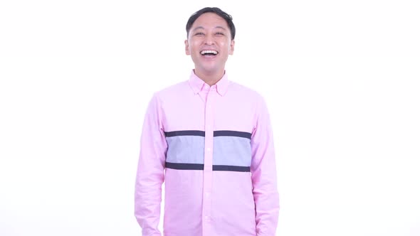Happy Japanese Businessman with Pink Shirt Smiling