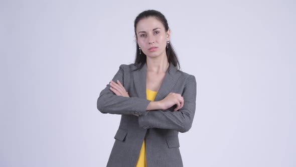 Young Beautiful Businesswoman with Arms Crossed