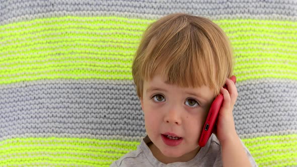 Little Smiling Child Boy Hand Holding Mobile Phone