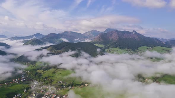 Morning Flight above Misty Clouds in Spring Country