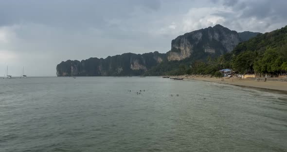 Time Lapse of Rain Clouds Over Beach and Sea Landscape with Boats