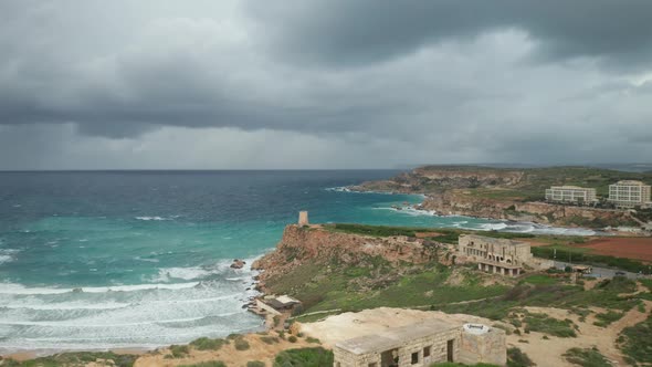 AERIAL: Panoramic Shot of Ghajn Tuffieha Bay on a Stormy Day