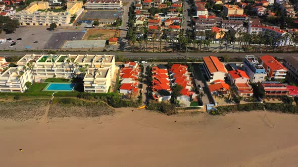 067_ojra.uas_Beach_LateralTraveling_AerialView_SunnyDay_4k. Side traveling aerial view from a drone