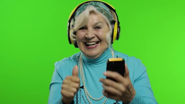 Elderly Grandmother. Caucasian Woman. Dance, Celebrate, Listen Music. Chroma Key