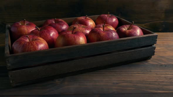 Red Apples In Crate Moving Shot