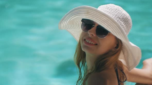 Woman In The Pool