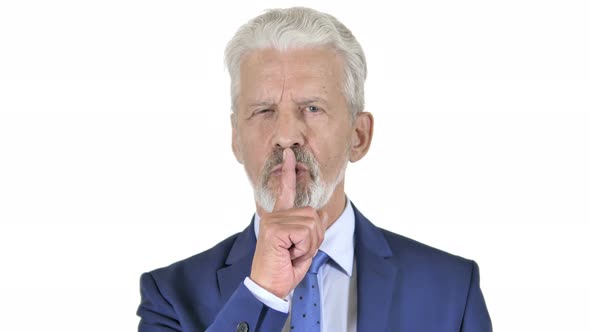 Silence Please Finger on Lips of Old Businessman Isolated on White Background