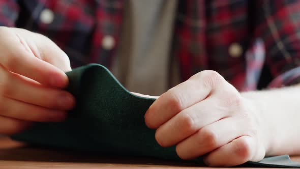 Craftsman Touching Leather Closeup Production of Handmade Accessories Made of Genuine or Artificial