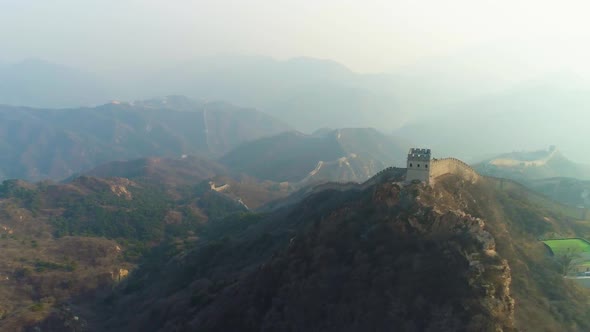 Great Wall of China and Green Mountains in Haze. Badaling. Aerial View