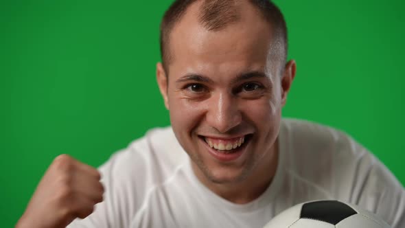 Successful Sportsman Leaning to Camera Gesturing Yes Smiling on Green Screen