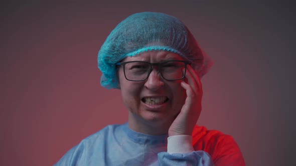 Portrait of Woman Patient in Hospital in Medical Clothes After Car Accident Received Face Injury and