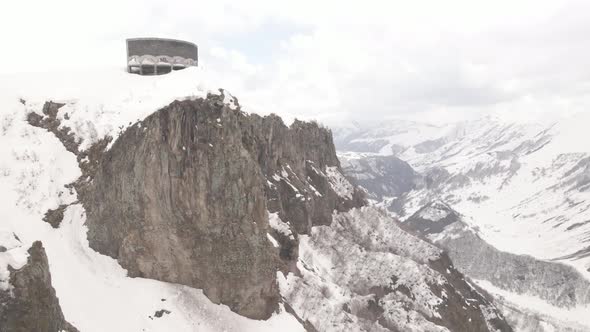 Gudauri, Georgia - April 17, 2021: Aerial view of Russia–Georgia Friendship Monument