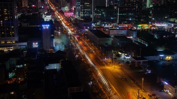 Beijing Night Aerial Cityscape Panorama with Road Traffic China Timelapse Pan Up