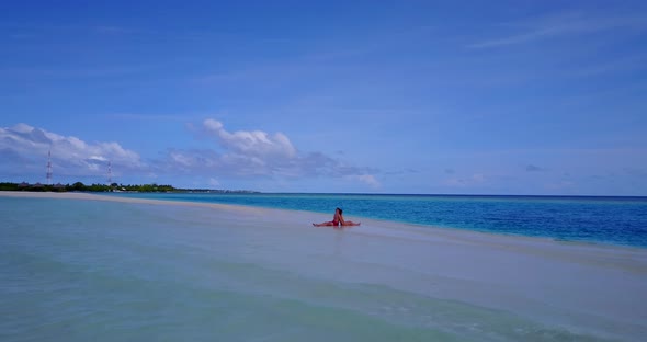 Young couple married on vacation enjoy life on beach on summer white sandy background 4K