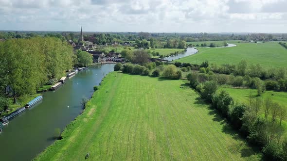 Scenic View At Lush Green Trees And Grassfields With River Thames In Abingdon Town, Oxford City, UK.