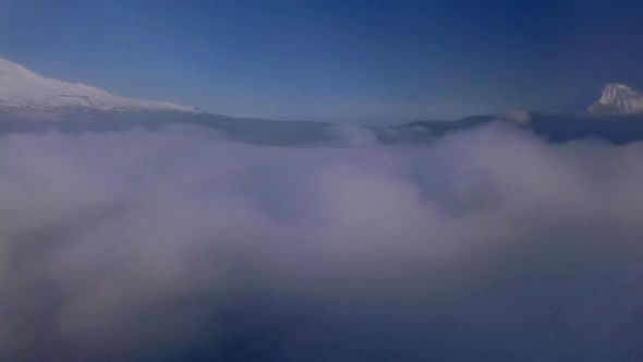 Tongariro volcanos from above clouds