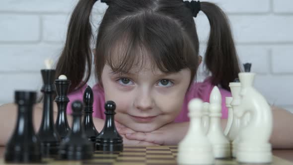 Portrait of a Child with Chess