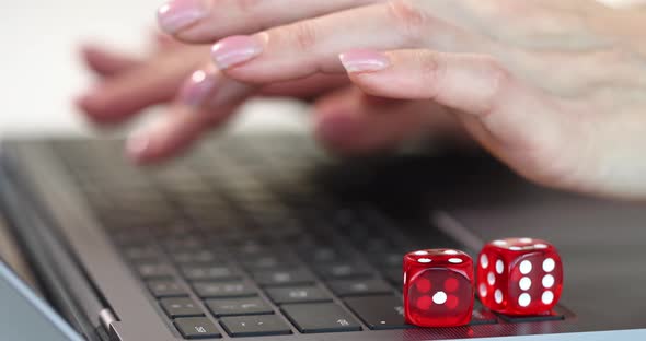 Online Gambling and Hand Work on Laptop Keyboard