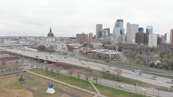 traffic in downtown minneapolis, skyline during a cloudy afternoon, aerial view