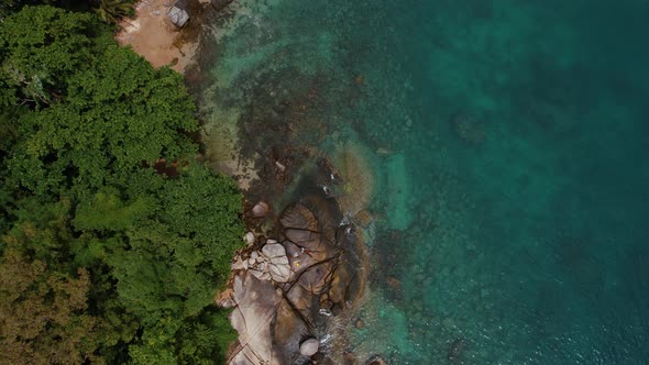 Aerial Drone Footage of Phuket Island in Beautiful Blue Sea with Little Waves in Thailand During Day