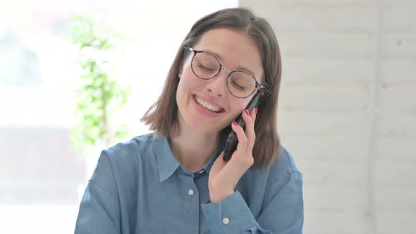 Young Woman Talking on Phone