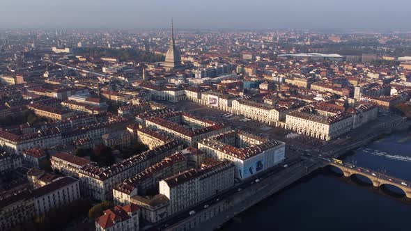 Turin, Italy cinematic aerial over the city, Mole Antonelliana and Po river