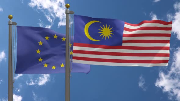 European Union Flag Vs Malaysia Flag On Flagpole