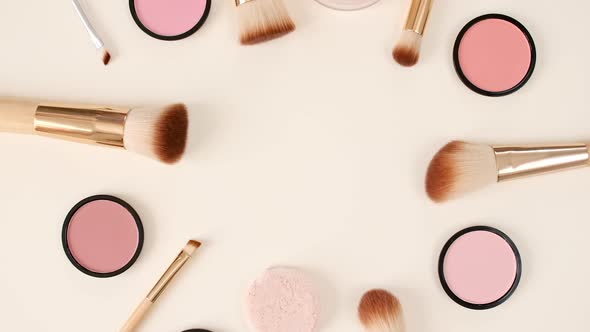 A Set of Decorative Cosmetics on Beige Background