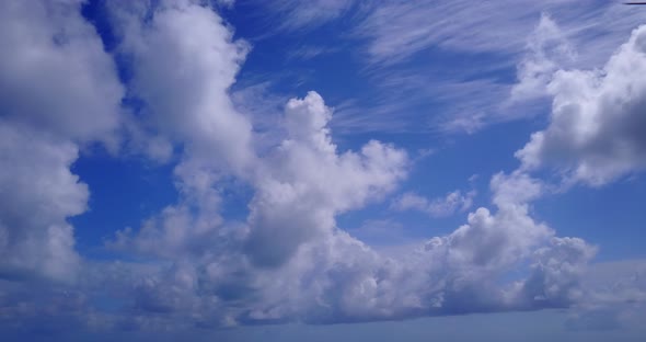 Beautiful aerial island view of a paradise sunny white sand beach and aqua blue water background in 