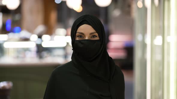 Portrait of a Woman in Hijab in Supermarket Wearing Mask