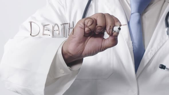 Asian Doctor Writing Death Benefits