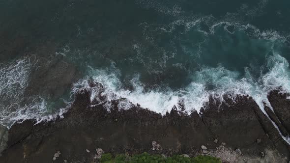 Waves crashing on rocks