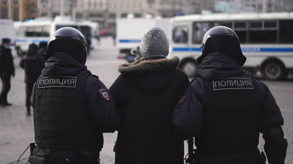 Riot Police Arrest Girl on Protest Russia