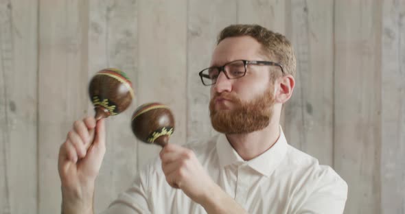Office Worker with Glasses Dancing with Maracas