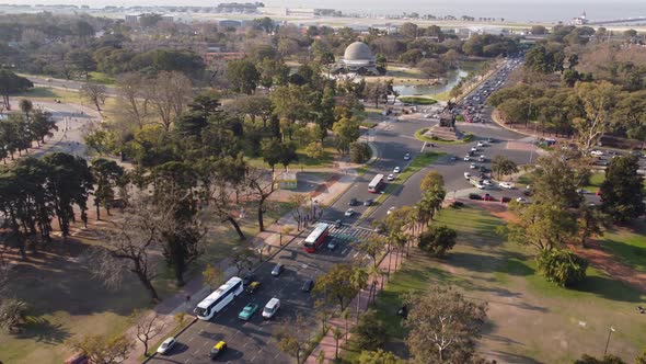 Aerial flyover road with driving cars and famous Galileo Galilei planetarium in background - Buenos