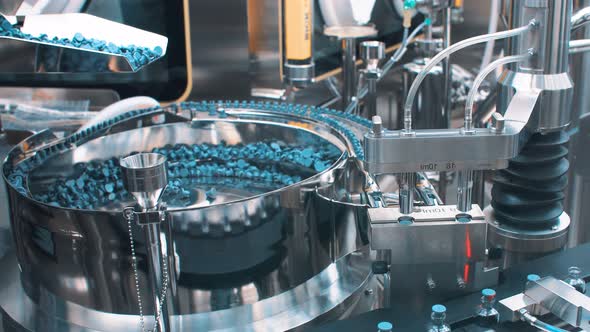 Production Line for Sealing Caps of Medical Vials and Ampoules After Filling the Medicine