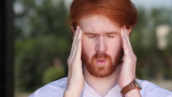 Headache, Portrait of Tense Young Designer in Office