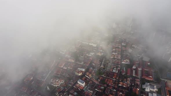 Aerial view Unesco heritage house covered by low cloud