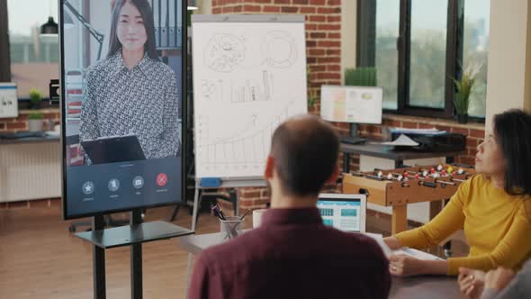 Diverse Team Attending Business Meeting on Video Conference