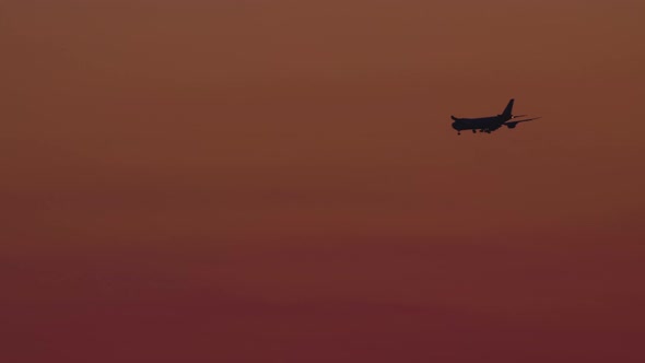 Aircraft on Final Approach at Sunset