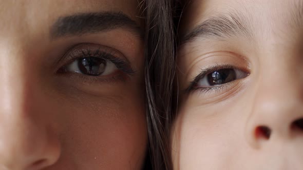 Two Halves of a Mother's and Daughter's Face Closeup